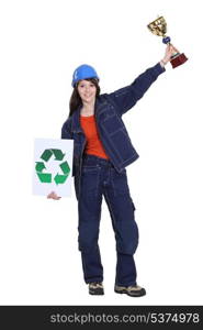 Woman winning award for recycling