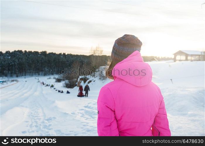 Woman winter portrait. Woman at heel at beauty winter day