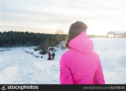Woman winter portrait. Woman at heel at beauty winter day