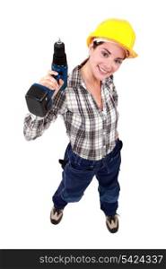 Woman with a cordless drill
