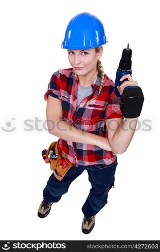 Woman with a cordless screwdriver