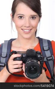 Woman with a digital camera