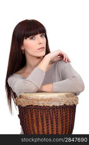 Woman with a djembe drum