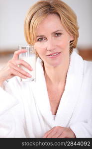 Woman with a glass of milk