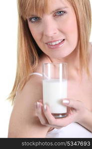 Woman with a glass of milk