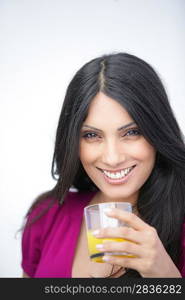 Woman with a glass of orange juice