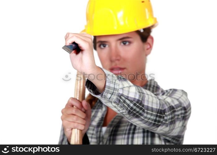 Woman with a hammer and chisel