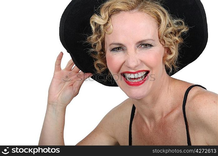 woman with a hat laughing