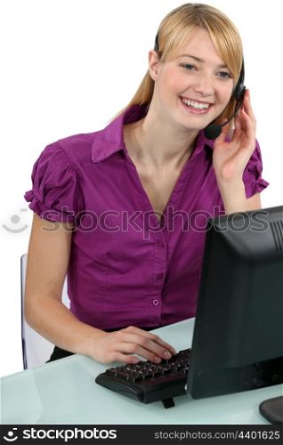 Woman with a headset laughing