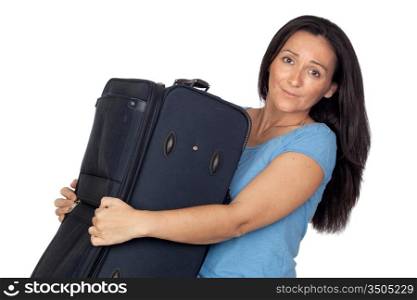 Woman with a heavy suitcase isolated on white background