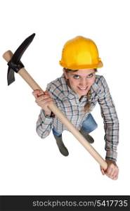 Woman with a helmet and pickaxe