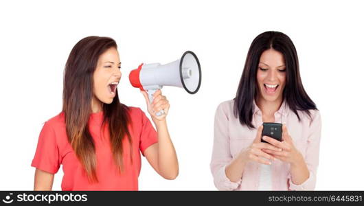 Woman with a megaphone shouting her friend with a mobile isolated on a white background