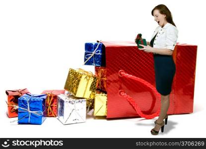 Woman with a pile of seasonal presents given during the Christmas season