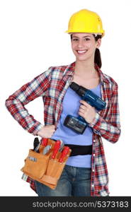 Woman with a power drill