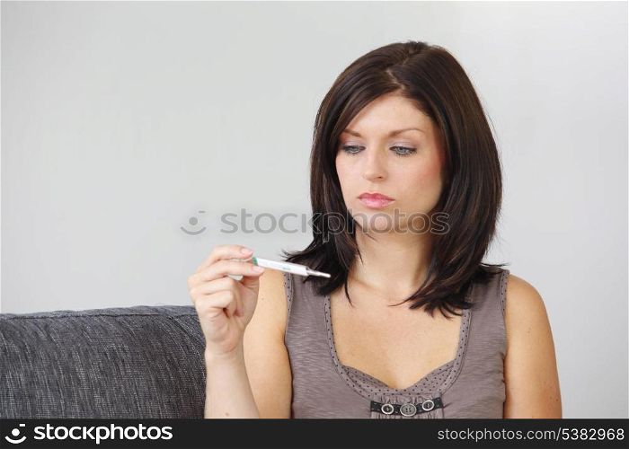 Woman with a pregnancy test