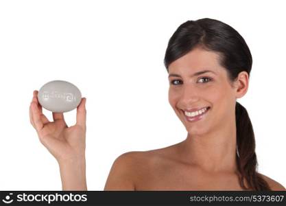 Woman with a stone etched &rsquo;natural&rsquo;