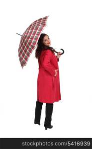 Woman with a tartan umbrella
