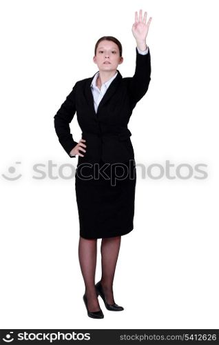 Woman with arm raised