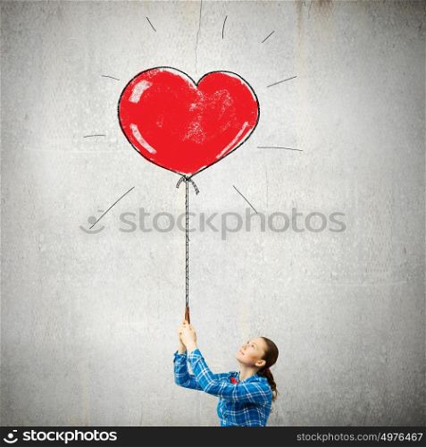 Woman with balloon. Young girl in casual with heart balloon
