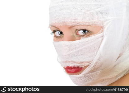 woman with bandages on her face closeup on white