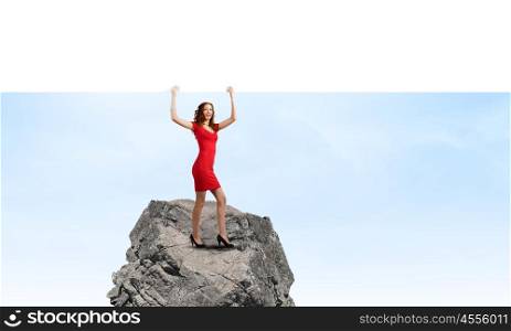 Woman with banner. Pretty woman in red dress with white blank banner