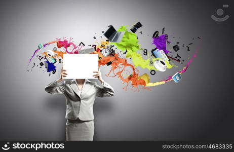 Woman with banner. Unrecognizable businesswoman holding white blank sheet of paper