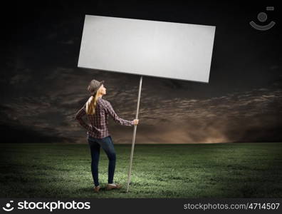 Woman with banner. Young girl in casual with white banner. Place for text