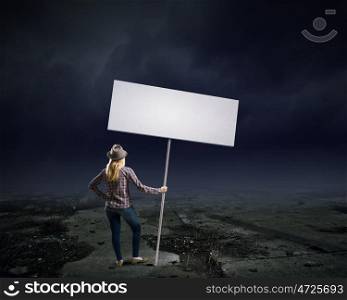 Woman with banner. Young girl in casual with white banner. Place for text
