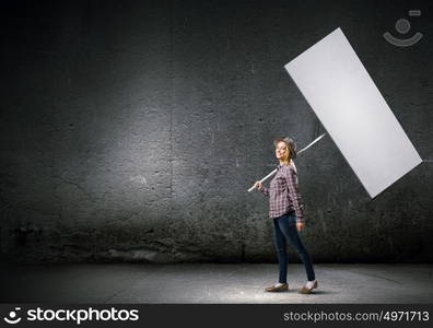 Woman with banner. Young girl in casual with white banner. Place for text