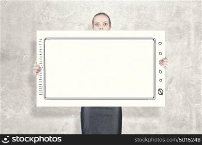 Woman with banner. Young woman showing white blank banner. Place for text