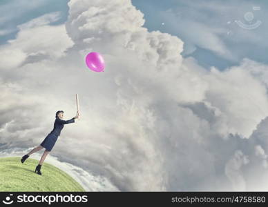 Woman with baseball bat. Young pretty woman in suit and hat with baseball bat