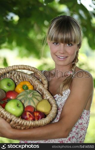 Woman with basket of fruit