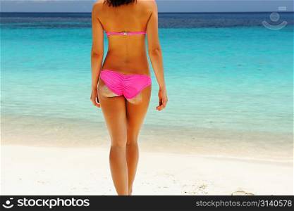 Woman with beautiful body at beach