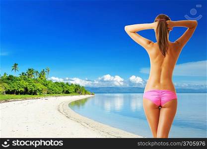 Woman with beautiful body at tropical beach. Collage.