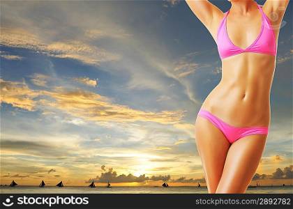 Woman with beautiful body on tropical beach at sunset. Collage.