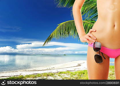 Woman with beautiful body wearing sunglasses at tropical beach. Collage.