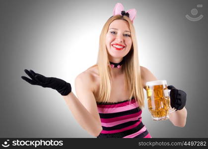 Woman with beer isolated on white