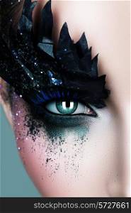 woman with black paper zigzag make-up