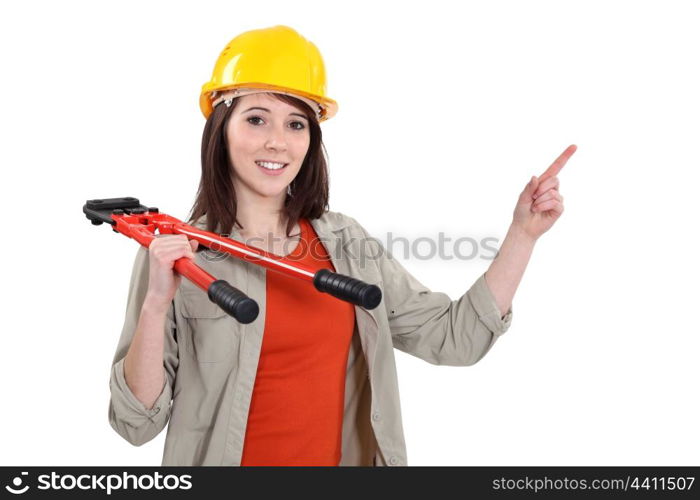 Woman with bolt-cutters pointing