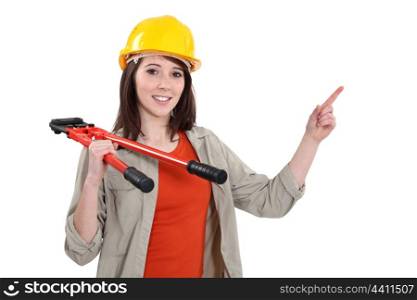 Woman with bolt-cutters pointing