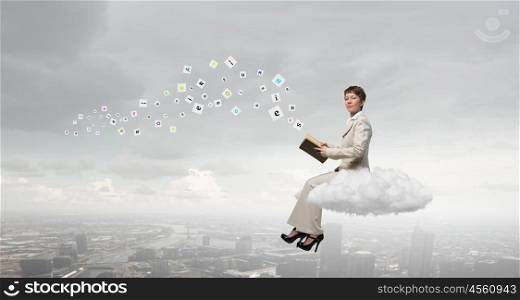 Woman with book. Adult woman in suit with old book in hand sitting on cloud
