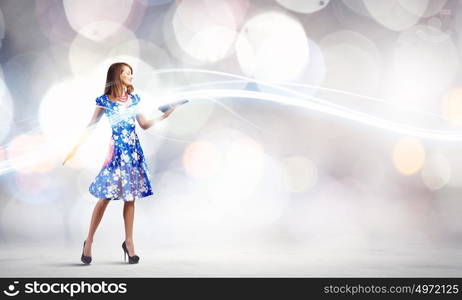 Woman with book. Young woman in blue dress reading book