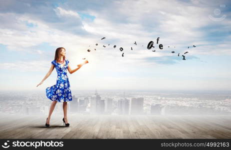 Woman with book. Young woman in blue dress reading book