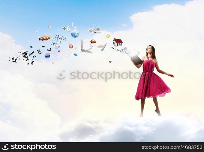 Woman with book. Young woman in rd dress reading book