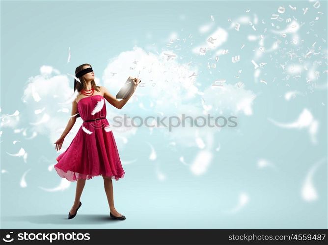 Woman with book. Young woman in red dress with book wearing blindfold