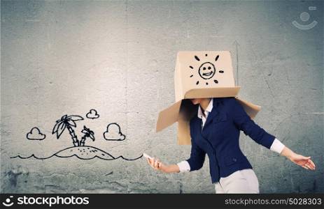 Woman with box. Businesswoman in suit wearing carton box on head