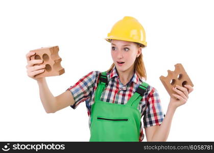 Woman with bricks isolated on white