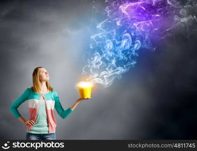 Woman with bucket. Young woman in casual with yellow bucket in hands