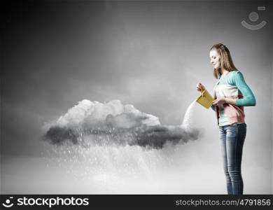 Woman with bucket. Young woman pouring water from bucket on cloud