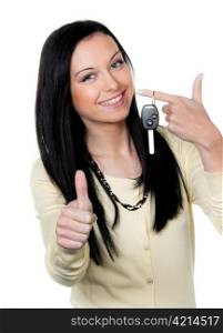 woman with car keys and driver&acute;s license. test
